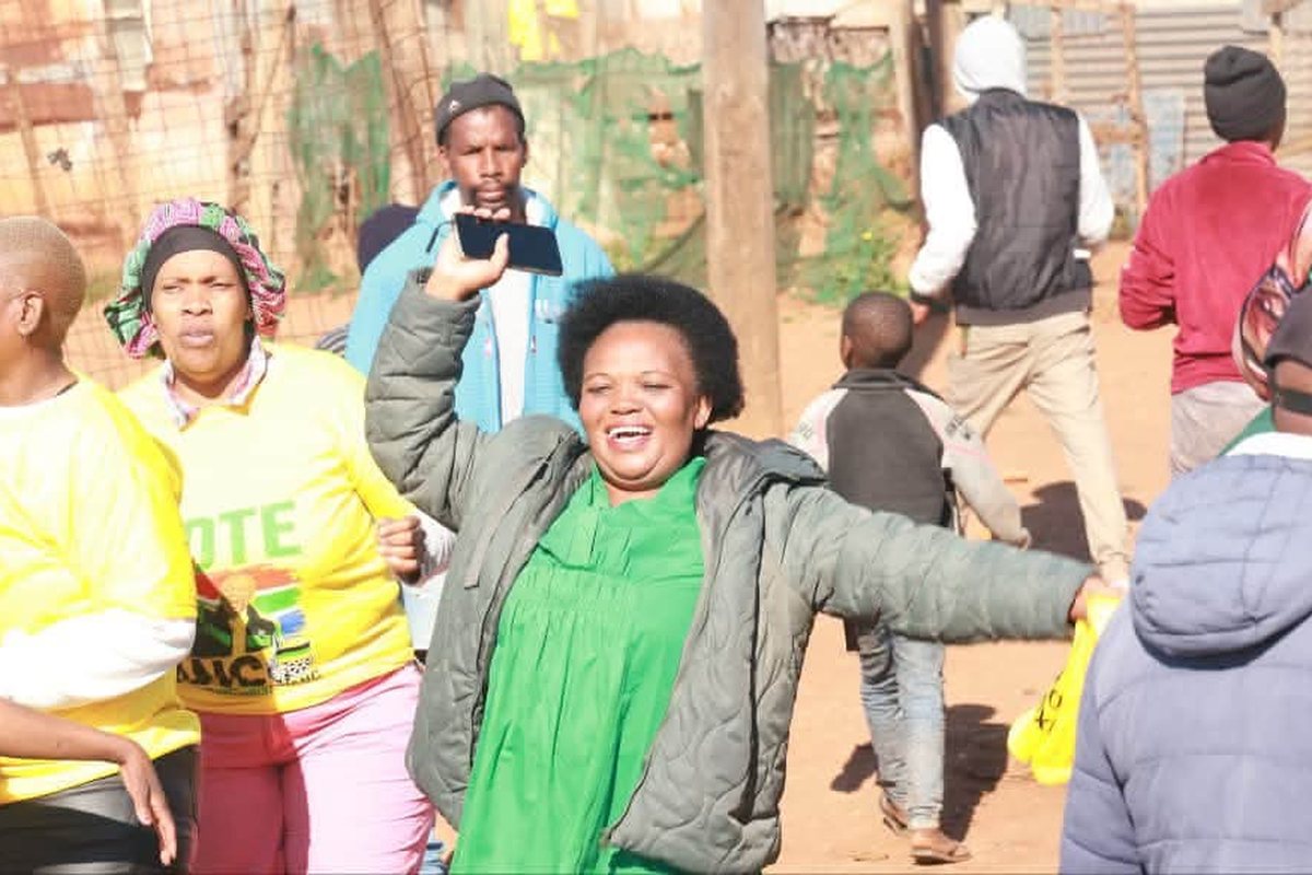 Jubilant ANC members and volunteers during the final voter registration drive in Nelson Mandela Bay
