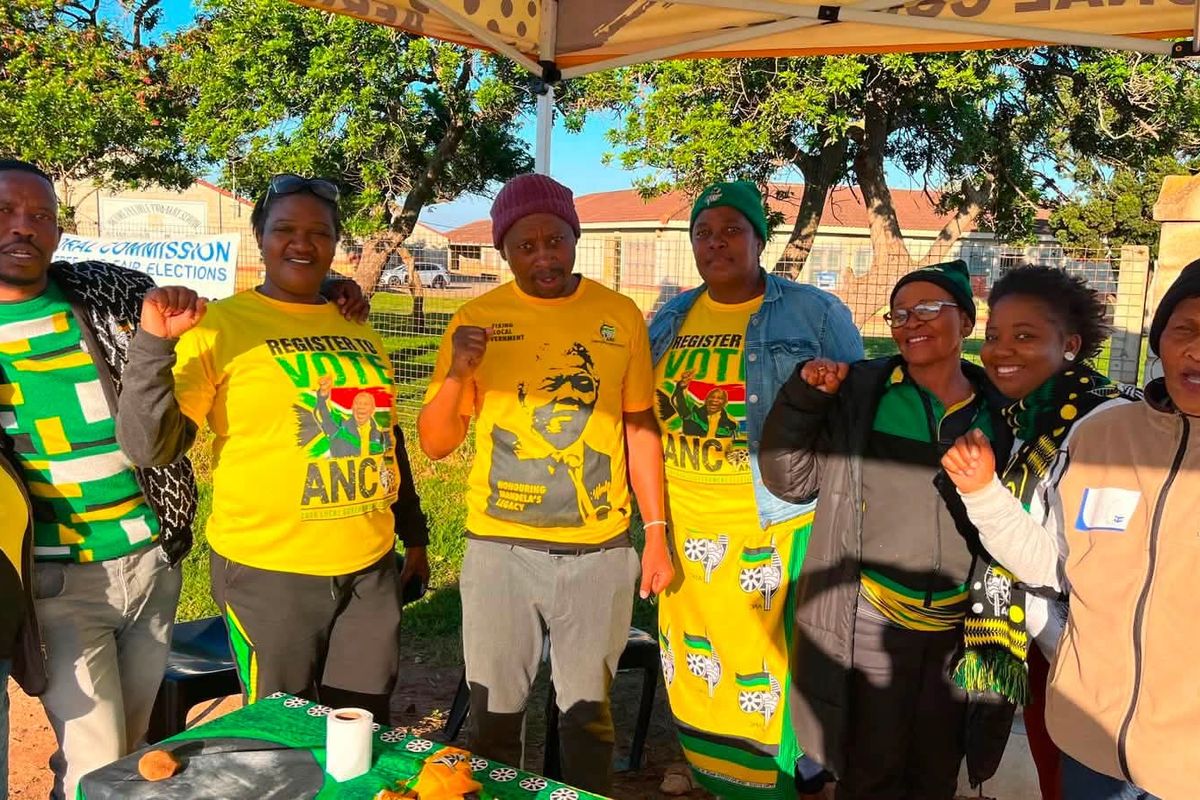 Resident NEC Member Andile Lungisa with ANC members and volunteers at the Ward 59 information desk