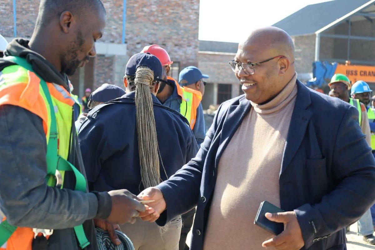 Government officials engage during the Nelson Mandela Bay compliance operation