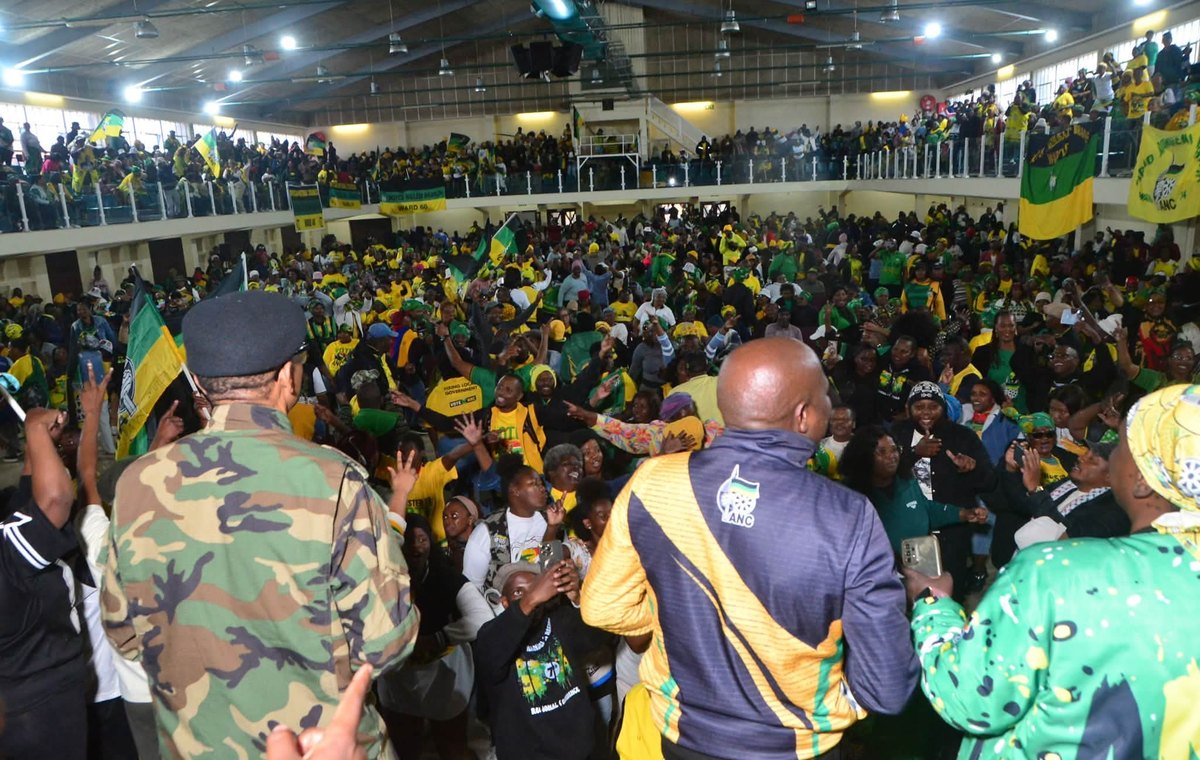 A view from the stage across the crowded main floor and gallery of Nangoza Jebe Hall.
