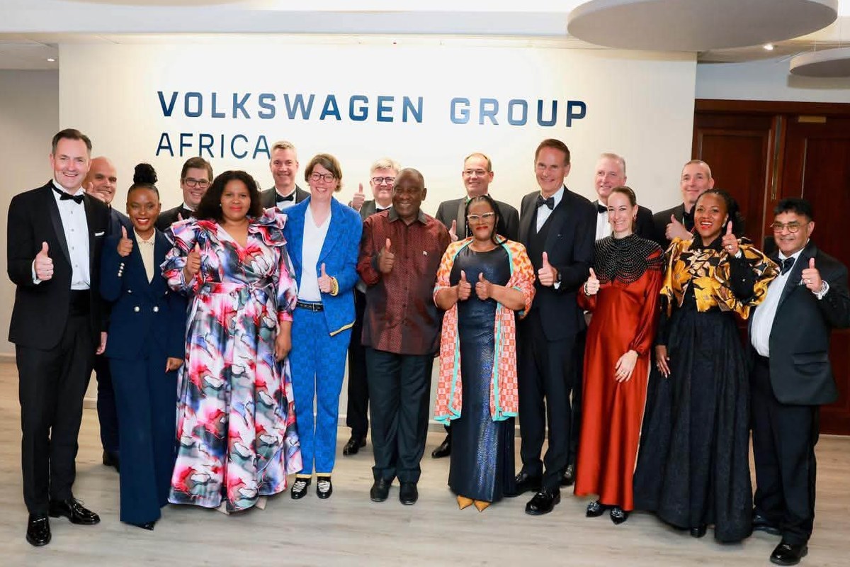 President Cyril Ramaphosa, Mayor Babalwa Lobishe, Martina Biene and Volkswagen leadership and dignitaries together under the Volkswagen Group Africa signage after the gala dinner