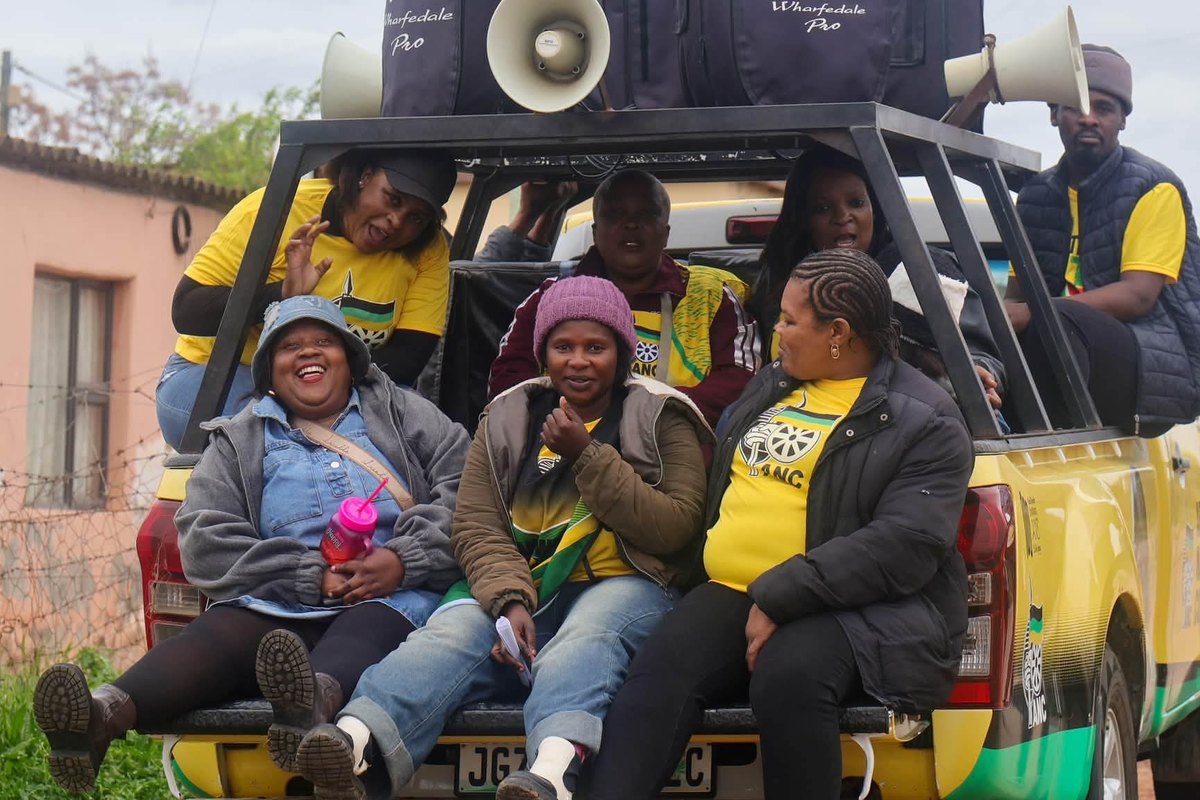 ANC volunteers and marshalls ride on a bakkie from the ANC’s revolutionary fleet during the Ward 46 campaign