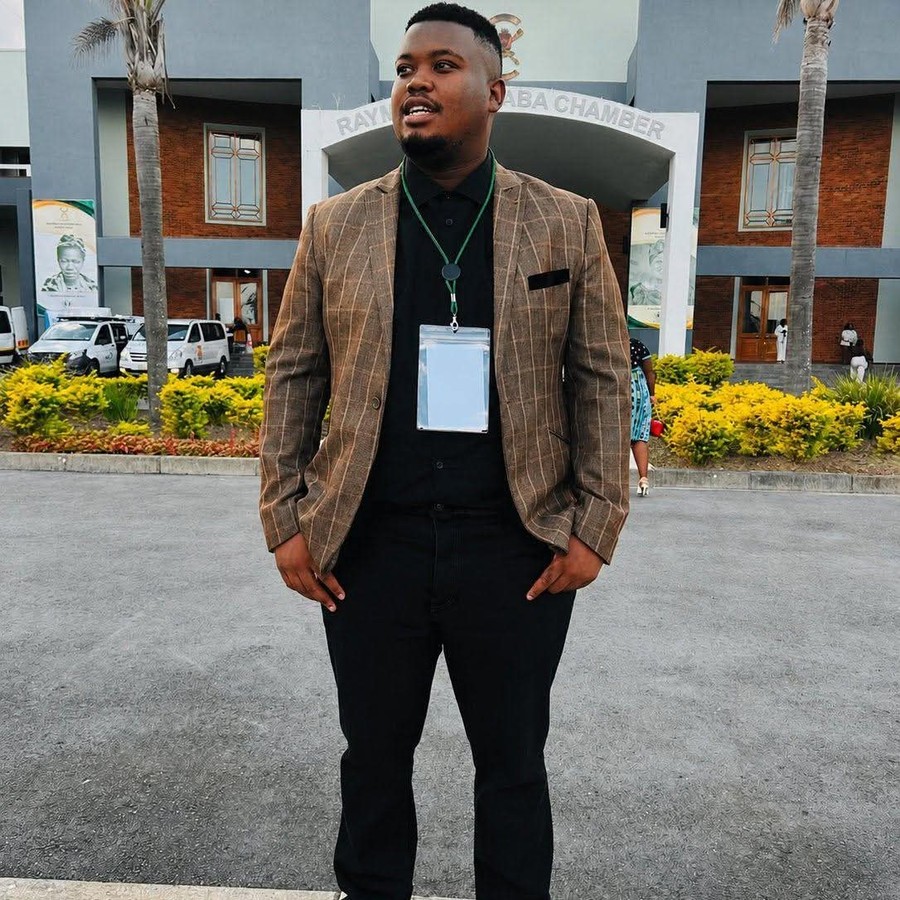 Thembalethu Nyikilana outside the Raymond Mhlaba Chamber