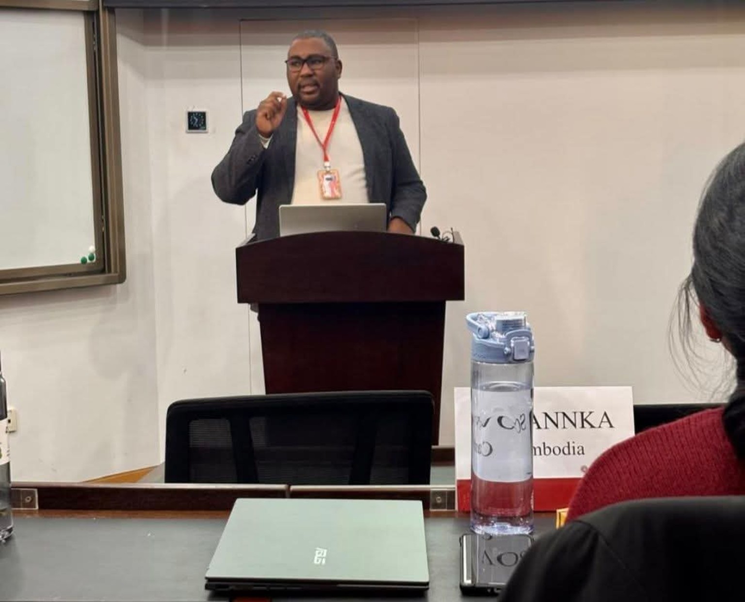Lukhanyo “Bhanda” Mtshingana speaking at a lectern.